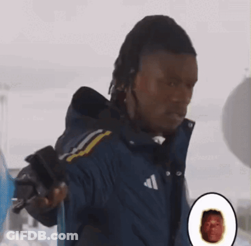 Man In Adidas Jacket Holding Gun GIF