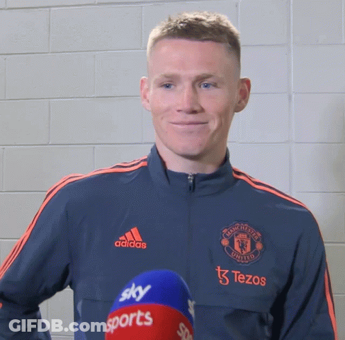 Man In Adidas Jacket With Sky Sports Microphone GIF