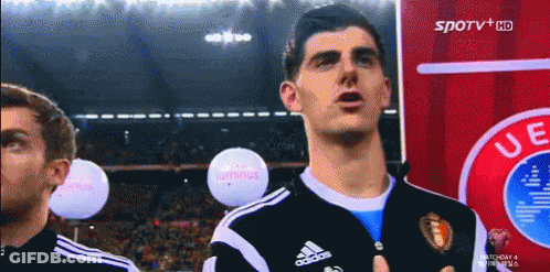 Man In Adidas Jersey At UE Logo GIF
