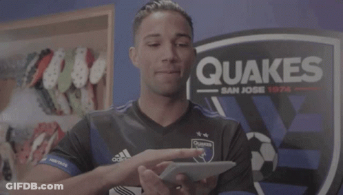 Man In Adidas Shirt Holding Box GIF