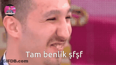 Man In Adidas Shirt Holding Sign Number 6 GIF