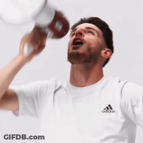 Man In Adidas T-Shirt Holding Bottle GIF