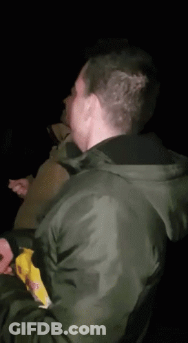 Man In Airborne Shirt Covering Face GIF