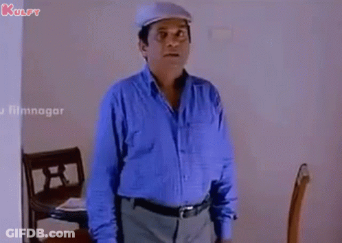 Man In American Flag Bandana Looking At Camera GIF