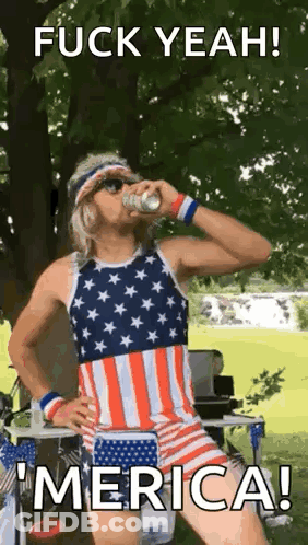 Man In American Flag Outfit Drinking Beer In Park GIF