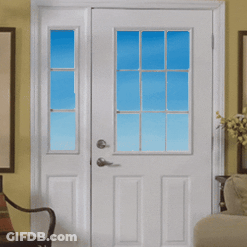 Man In American Flag Tie Looking Out Window GIF