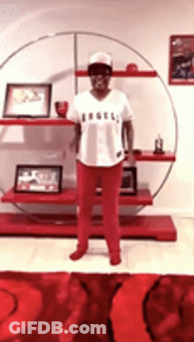 Man In Angels Jersey At Shelf GIF