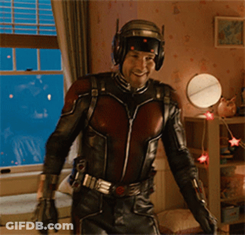 Man In Ant-Man Costume Standing In Room GIF