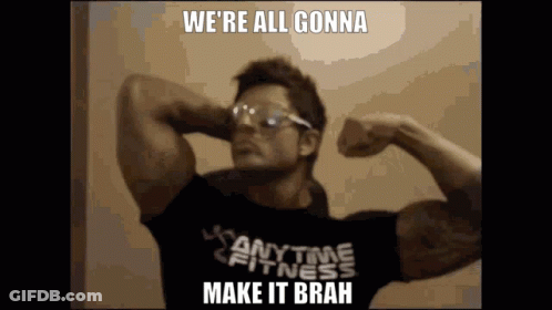 Man In Anytime Fitness Shirt Flexing Muscles GIF