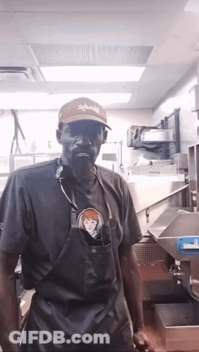 Man In Apron And Hat Saying Wendy's GIF