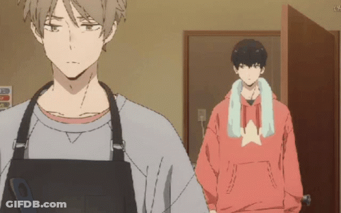 Man In Apron And Red Hoodie Standing GIF