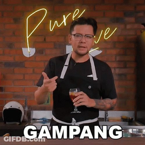Man In Apron Holding Beer With Gampang GIF