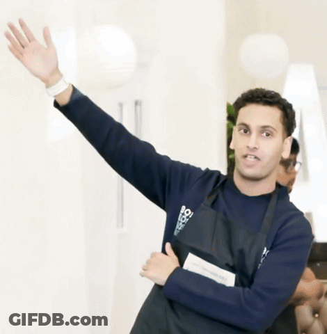 Man In Apron Saying Bo Waving GIF