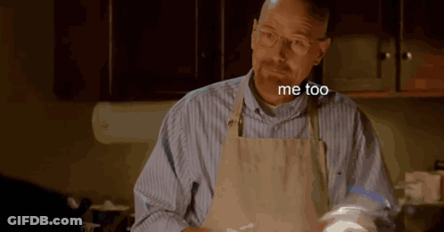 Man In Apron Saying Me Too In Dark Kitchen GIF