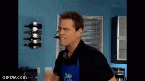 Man In Apron Saying Sap Clean In Kitchen GIF