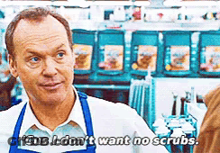 Man In Apron Talking To Another Man In Store GIF
