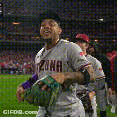 Man In Arizona Jersey Holding Glove GIF