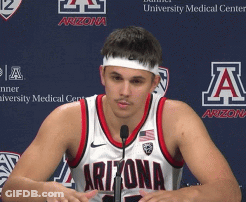 Man In Arizona Jersey Talking Into Microphone GIF