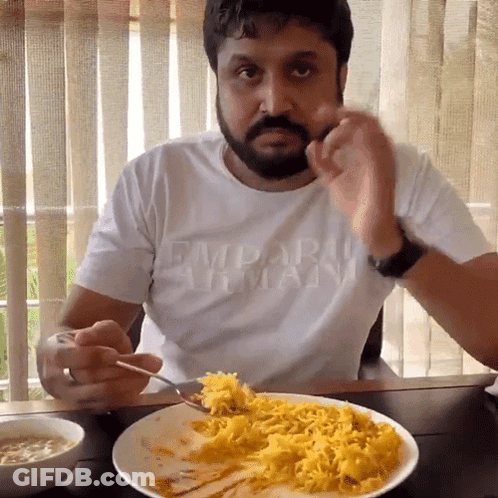 Man In Armani Shirt Eating Food GIF