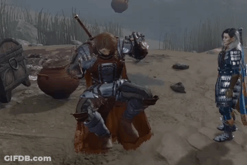 Man In Armor Holding Hammer In The Air GIF