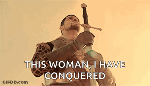 Man In Armor Holding Sword In Mouth GIF