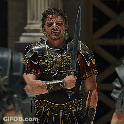Man In Armor Holding Sword With Greek Key Pattern GIF