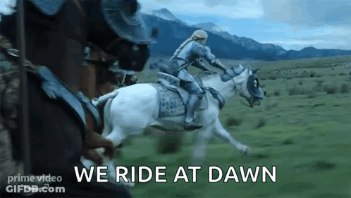 Man In Armor Riding Horse In Field GIF