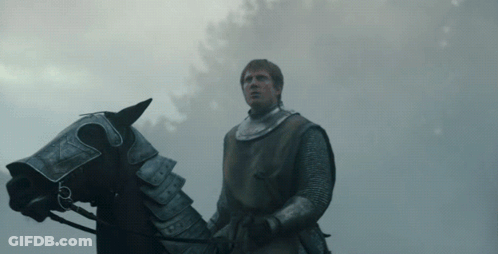 Man In Armor Riding Horse In Rain GIF