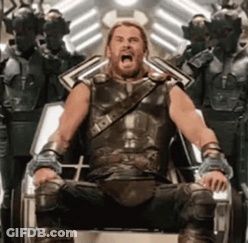 Man In Armor Sitting On Throne With Open Mouth GIF