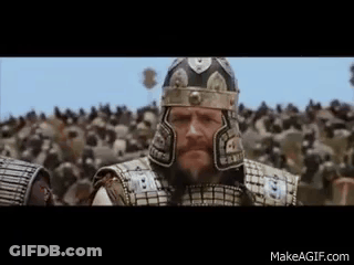 Man In Armor Standing Before Crowd GIF