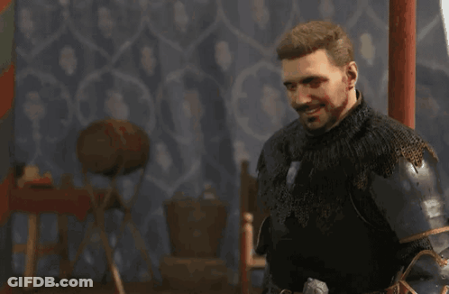 Man In Armor Standing In Front Of Wall GIF