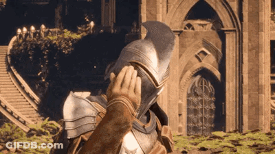 Man In Armor Touching Helmet In Front Of Building GIF