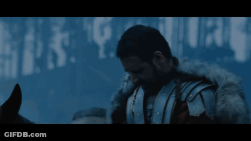 Man In Armor With Unleash Hell Sign GIF