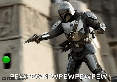 Man In Armored Suit Holding Gun GIF