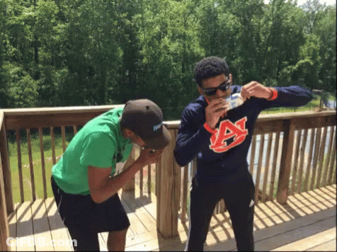 Man In Auburn Sweatshirt Drinking From Bottle GIF