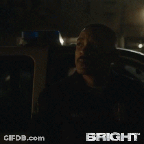 Man In Back Seat Looking Out Window GIF