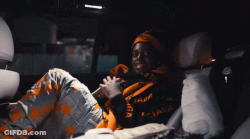 Man In Back Seat Wearing Balenciaga Sweater GIF