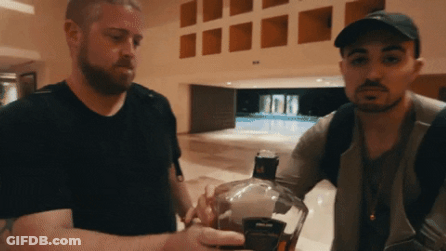 Man In Backpack Drinking Alcohol Gulp GIF