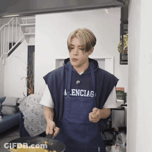 Man In Balenciaga Apron Cooking GIF