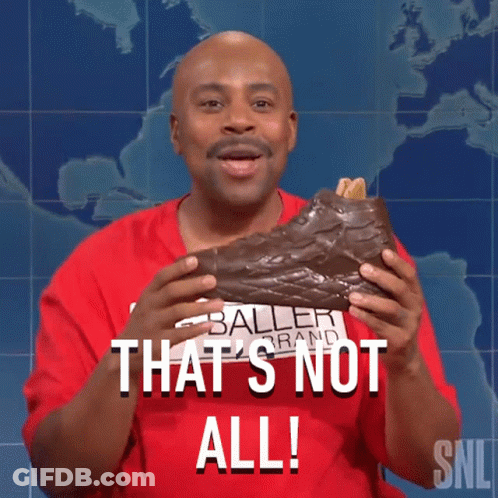 Man In Baller Brand Shirt Holding Chocolate Shoe GIF