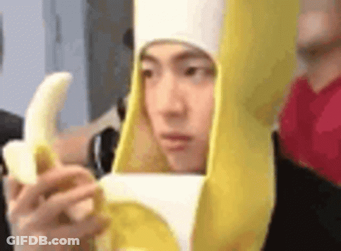 Man In Banana Costume Holding Banana GIF
