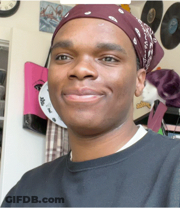 Man In Bandana And Black Shirt Smiling GIF