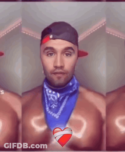 Man In Bandana And Hat In Front Of Red Heart GIF