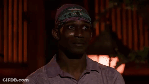 Man In Bandana And Pink Shirt Making Funny Face GIF
