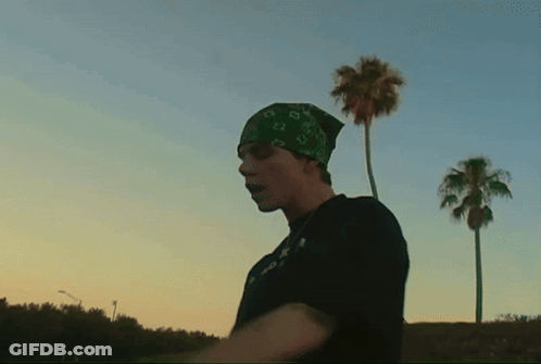 Man In Bandana And T-Shirt Saying A GIF