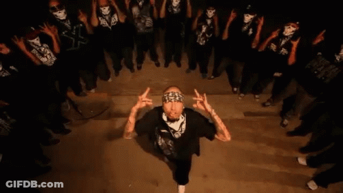 Man In Bandana Facing Crowd GIF