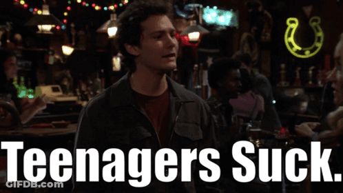 Man In Bar With Teenagers Suck Text GIF