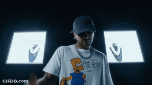Man In Bart Simpson T-Shirt In Front Of Screen GIF