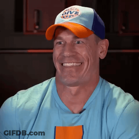 Man In Baseball Cap And Blue Shirt Making Funny Face GIF