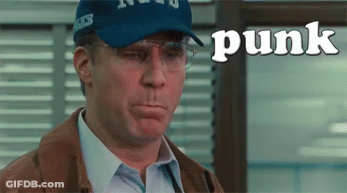 Man In Baseball Cap And Glasses Making Funny Face With Punk GIF